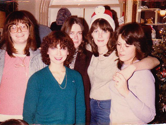 The Snell Sisters.Upfront: Susan (blue sweater)Backrow left to right:Linda, Nancy, Chris, Evelyn